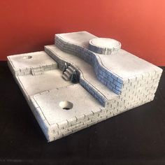 a model of a castle made out of cement