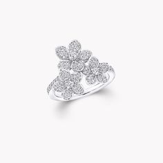 A trio of diamond blossoms flourish with rare abundance upon our Wild Flower ring, joyful and uplifting. Shimmering with diamonds, each petal is uniquely realised and placed to lift towards its wearer with extraordinary lightness, like flowers freshly bloomed. Updating the traditional English Garden with carefree charm and a contemporary spirit, four varieties of flower flourish in rare abundance in our Wild Flower garden, inspiring you to mix, match and make everyday diamonds your own. An expre Large Diamond Stud Earrings, Traditional English Garden, Wild Flower Garden, Diamond Shaped Engagement Ring, Large Diamond Rings, Pear Shaped Diamond Ring, Flower Diamond Ring, Pave Diamond Earrings, Fine Diamond Jewelry