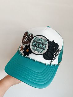 This custom made trucker patch hat is perfect for any occasion whether it be for spring/summer time, a lake hat, a gift for someone, or just a cute accessory to add a little spice to your outfit 🧢✨ DETAILS-  * This hat is one size with an adjustable SnapBack that is adjustable from 20in. - 23.5in. * The color of this hat is Turquoise & White * The material of the hat is polyester with iron on patches  REFUNDS AND CANCELLATIONS- Every hat is handmade by me as a result, a slight variation can occ Trucker Hats With Patches Diy, Patch Trucker Hat Ideas, Trucker Hat Patches, Hat With Patches, Iron Patches, Diy Hats, Camo Trucker Hat