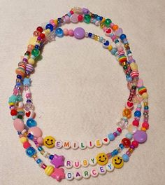 Bright, colourful and fun mixed bead necklace. Can be personalised with any name or word please let me know on checkout. Necklaces are elasticated and made using high quality elastic. Designs will vary and will all be individual but will all include a smiley! 😍 letters may be rainbow or black depending on stock. Perfect stocking fillers, birthday gifts or just a day brightener! A handy necklace length image can be found in pictures. Please choose the length you require at checkout 🥰 Mixed Beaded Necklace, Beaded Necklace With Letters, Fun Adjustable Beaded Necklaces For Birthdays, Fun Adjustable Beaded Necklaces For Birthday, Fun Adjustable Beaded Necklace For Birthday, Adjustable Multicolor Necklace For Personalized Gift, Cute Personalized Multicolor Necklaces, Cute Multicolor Personalized Necklaces, Cute Multicolor Customized Jewelry