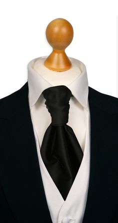 Introducing our black satin cravat, the epitome of classic clean look for party wear. Crafted with exquisite silk, this cravat showcases a deep black color that exudes sophistication and timeless style. Its sleek and smooth texture provides a luxurious feel, making it a perfect accessory for formal events, weddings, or any occasion that calls for a touch of elegance. Elegant Silk Tuxedo, Elegant Fitted Suit And Tie Accessories For Party, Black Silk Tuxedo For Party, Black Silk Tuxedo For Weddings, Elegant Black Wedding Tuxedo, Classic Fitted Ties For Formal Occasions, Elegant Solid Bow Tie, Black Tuxedo Suit And Tie Accessories For Formal Occasions, Classic Satin Suit And Tie Accessories