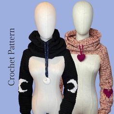 two mannequins wearing sweaters with hearts on them