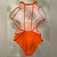 It May Look Red But It's More Of A Bright Orange, Never Worn Before & Sorry I Do Not Email Any Details Of My Listings Stretch Orange One-piece For Pool, Orange Bodysuit For Summer Parties, Summer Swimming Bodysuit In Orange, Orange Stretch One Pieces For Poolside, Orange Stretch One Piece For Poolside, Summer Stretch Orange Bodysuit, Orange Beachwear Bodysuit For Summer, Orange One-piece Bodysuit For Beach, Orange Stretch One-piece For Poolside