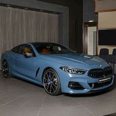 the new bmw 8 series coupe is on display