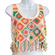 Granny Square Cropped Tank Top Multi Colored Fringe Not Lined White Orange Pink Yellow Green One Size See Measurements To Help Determine Fit. Apprx Laying Flat: Pit To Pit Shoulder To Hem (Not Including Fringe) Shoulder To Hem (Including Fringe) Boutique Nwt Bundle 2 Or More Items For Best Offer Due To Difference In Lighting And Device Resolutions, Color May Slightly Vary From Photos. Jo72.910 Crochet Patchwork Festivals Granny Core Multicolor Sleeveless Crochet Top For Beach, Pink Tank Crop Top For Beach, Multicolor Crochet Sleeveless Tank Top, Multicolor Sleeveless Crochet Top For Vacation, Multicolor Sleeveless Crochet Lace Top, Spring Vacation Crochet Tank Top, Multicolor Crochet Lace Sleeveless Top, Pink Crochet Trim Top For Festival, Sleeveless Crochet Trim Crop Top For Spring