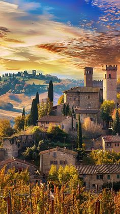 an image of a village in the hills with trees and bushes around it at sunset