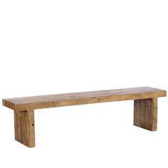 a wooden bench sitting on top of a white wall