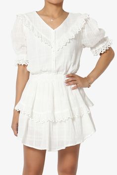 Tille Lace Trim Tiered Dress in Ivory Daywear Puff Sleeve Tiered Dress With Ruffles, Puff Sleeve Tiered Dress With Ruffles For Daywear, Daywear Puff Sleeve Dress With Tiered Skirt And Ruffles, Daywear Puff Sleeve Dress With Ruffles And Tiered Skirt, Casual Puff Sleeve Dress With Ruffles, Flowy Short Sleeve Puff Dress With Ruffle Hem, Flowy Puff Sleeve Dress With Ruffle Hem, Short Sleeve Puff Dress With Lace Trim, Summer Puff Sleeve Dress With Tiered Ruffle Hem