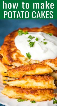 potato cakes on a plate with sour cream and parsley