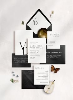 an elegant black and white wedding suite with the letter y on it's front