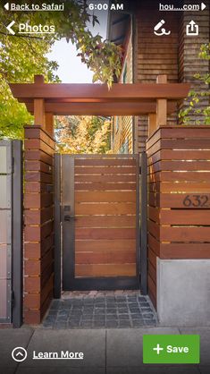 an entrance to a house with wooden slats on the sides and doors that lead into it