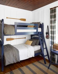 a bunk bed with two sets of paddles on the top and bottom bunk beds