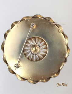 "Beautiful vintage unsigned gold tone abstract modernist brooch pin. It has a rollover safety catch on the back. It's in wonderful condition and would be an asset in anyone's vintage jewelry collection. There is no wear to the gold and the clasp works very well. The brooch measures approximately 2 1/8\" in diameter, almost 0.5\" thick. Multiple Jewelry International shipping discount: 1-7 pieces of Single Jewelry = $18.99. We combine shipping, If you want to take advantage of the reduced shippin Gold Modernist Brooch For Formal Occasions, Modernist Gold Brooch For Formal Occasions, Modernist Gold Brooch Jewelry, Modernist Gold Brooch, Modernist Gold Brooches For Gifts, Mid-century Gold Brooch Jewelry, Gold Art Deco Brooches For Anniversary, Gold Art Deco Anniversary Brooches, Flower Vintage