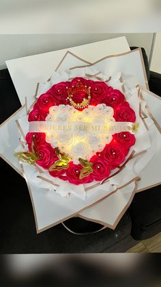 a heart shaped cake with roses in it