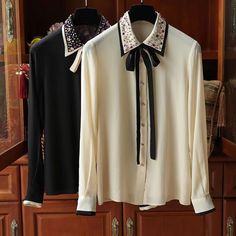 Long Sleeve Blouse With Embellished Collar For Work, Elegant Fall Tops With Embellished Collar, Designer Fall Blouse With Collar, Designer Long Sleeve Embellished Blouse, Luxury Casual Silk Shirt, Designer Embellished Long Sleeve Tops, Luxury Silk Evening Shirt, Luxury Button-up Shirt For Formal Occasions, Elegant Embellished Silk Tops