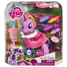 the little pony is holding a pink brush and hairbrush in its box, it's packaging