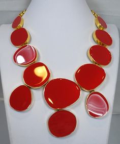 "This signed Kenneth Lane necklace has red enameled multi-shaped disks in a gold tone setting. The necklace measures 18-1/2\" long and 5\" wide at front center. It has a gold chain with a hook clasp. A single disk is 1-1/2\" in diameter. This necklace is signed Kenneth Lane and is in excellent condition." Red Enamel Round Necklace, Gold Enamel Necklace For Party, Gold Enamel Party Necklace, Formal Red Enamel Necklaces, Formal Red Enamel Necklace, Stone Statement Necklace, Bib Necklaces, Hook Clasp, Creative Jewelry