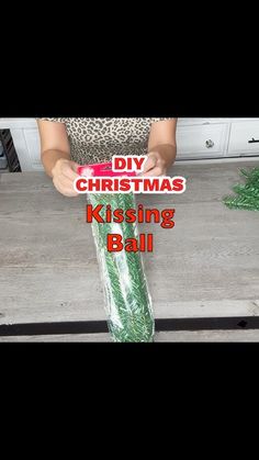 Diy Christmas Garland With Ornaments, Diy Kissing Ball Christmas, Christmas Kissing Balls Diy, Candy Cane Garland Diy, Christmas Ornament Garland Diy, Christmas Ball Garland Diy, Christmas Kissing Balls, Dollar Tree Garland, Diy Ornament Garland