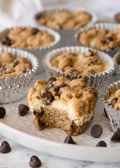 chocolate chip muffins are sitting on a tray