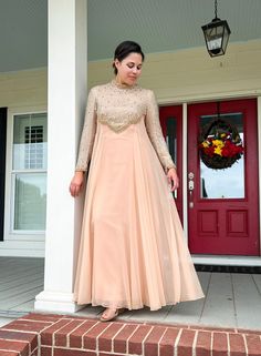 This is a rare find! It is in pristine condition. The dress is very flattering with an empire waist that comes to a v shape in the front and back. The bodice and sleeves are covered in silver sequins and beads and outlined with gold beads. The flowing blush chiffon skirt is softly gathered at the sides and back. The maker is Victoria Royal Ltd made in British Crown Colony and has a size 14 tag. Sleeves have a zipper at the wrist. Please use the measurements below when determining fit. I do not accept returns or exchanges.  Length: 55" Bust: 40" Sleeve length: 21 1/2 " Sleeve opening at wrist: 8" Don't hesitate to contact me if you have any questions! I Long Sleeve Evening Dress With Pleated Bodice For Gala, Empire Waist Fitted Dress For Gala, Empire Waist Gala Dress, Long Sleeve Gown With Pleated Bodice For Gala, Empire Waist Formal Dress For Prom Season, Fitted Empire Waist Dress For Gala, Empire Waist Prom Season Evening Dress, Empire Waist Evening Dress With Pleated Bodice, Vintage Floor-length Gown For Banquet