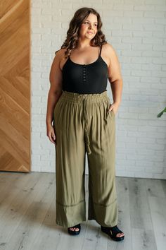 Embark on a stylish journey with our Exciting Escapade Wide Leg Pants, crafted to blend comfort with playful style. Made from woven fabric, these pants offer a lightweight and breathable feel, perfect for all-day wear. The cased elastic waistline ensures a comfortable fit while the ruffle details and geometric embroide Greek Vacation Outfit, Ribbed Knit Bodysuit, Geometric Embroidery, Knit Bodysuit, Back To Nature, Dress Romper, Outerwear Women, Woven Fabric, Long Tops