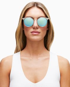 Reflect your Cali style in our mirrored Malibu shades. Featuring oval frames with a flattering double bridge design, these shades will instantly conjure a Hollywood mindset and Sunset Strip strut. The silver frame and ice blue reflective lenses are complemented by black acetone tips, while the engraved logo on both temples add some special flair. Throw these on with our Printed Ember Dress for a Santa Monica Pier vibe. Also available in: Rose Gold Details Frame Material: Metal Frame Frame Color: Trendy Sunglasses With Mirrored Lenses And Round Frame, Trendy Round Frame Sunglasses With Mirrored Lenses, Silver Sunglasses With Mirrored Lenses For Spring, Trendy Aviator Sunglasses With Mirrored Round Frame, Silver Tinted Cat Eye Sunglasses For Summer, Silver Cat Eye Sunglasses With Tinted Lenses For Summer, Beach Sunglasses With Round Glass Frame, Silver Aviator Sunglasses With Mirrored Lenses For Summer, Summer Silver Aviator Sunglasses With Mirrored Lenses