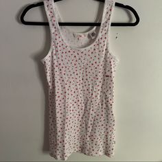 New With Tags Levi’s White Floral Tank Top. It Is In Perfect Condition! Size Small (S). Retail Price: $19.50 Levi's Cotton Tops For Spring, Fitted Levi's Tops For Summer, Red Strawberry Print Top For Spring, Red Strawberry Print Tops For Spring, Casual White Tank Top With Floral Print, White Casual Tank Top With Floral Print, Levi's Fitted Summer Tops, Casual White Floral Print Tank Top, Fitted White Tops With Strawberry Print