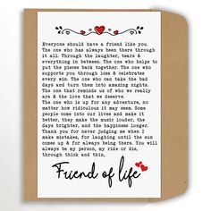 a card with the words friend of life written on it in black and red ink