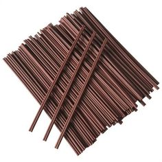 several brown sticks are stacked on top of each other