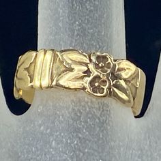 This Lovely Hand Carved Foliage Lady Ring Band From Early Century, Crafted In 14kyellow Gold, The Etching Is Throughout, Sinuous Margin, 6.53mm Wide, Weight 3.3gm, Size 6.25, Hallmark 14k (1 Inch = 25.4 Mm; 1 Dime = 17.9mm). All Items Are Pre-Owned Unless Otherwise Stated. This Means They Have The Usual Aspects Of Pre-Owned Jewelry, Such As Light Scratches, Wear And Tarnish. Please Review All The Photos Which Will Be Part Of The Description. Yellow Gold Engraved Band Rings, Engraved Yellow Gold Band Ring, Gold Bands Stamped 14k Fine Jewelry, Stamped 14k Gold Fine Jewelry Bands, Yellow Gold Open Band With Diamond Cut, Heirloom Yellow Gold Hallmarked Bands, Heirloom Hallmarked Yellow Gold Bands, Victorian Yellow Gold Engraved Ring With Diamond Cut, Yellow Gold Victorian Engraved Ring With Diamond Cut