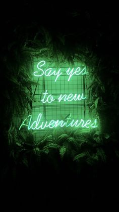 a neon sign that says say yes to new adventures