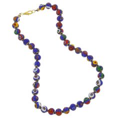 This beautiful Murano Glass Millefiori necklace offers classic Venetian style and effortless chic. Centuries-old Murano glass decorative technique perfected by Italian craftsmen is used to create colorful mosaic effect that is fun and trendy, yet classic and timeless. This necklace is a unique accessory that will add glamour and elegance to your look. Measurements: This necklace measures 15 to 16 inches in length and comes with an attractive velvet pouch and a certificate of authenticity. Becaus Mosaic Necklace, Murano Glass Necklaces, Murano Glass Jewelry, Necklace Blue, Glass Mosaic, Elegant Accessories, Venice Italy, Blue Bracelet, Jewelry Packaging