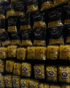 many packages of macaroni and cheese are on display