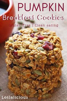 pumpkin breakfast cookies are stacked on top of each other with cranberry sauce in the background