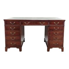 an antique wooden desk with marble top and brass hardware on the legs, against a white background