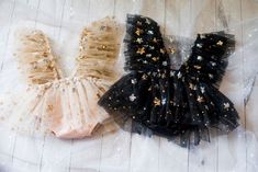 This is a listing for ivory and gold stars tulle dress or black stars dress. You can order any one dress or both at a reduced price.  Size: Sitter (9-18 m) Ready to ship! All used materials are new.  All items are made with care in a smoke/pet free environment. I would like to invite you to Your Dream Pix LLC VIP customers group!  Please, join us for all news and updates from my shop, new products, SALES and discounts.  https://www.facebook.com/groups/550907811777869/ Thank you! Baby Tulle Dress, Celestial Dress, Baby New Year, Stars Dress, Gothic Baby, Baby Birthday Dress, Newborn Halloween, Goth Baby