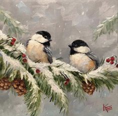 two birds sitting on top of a branch covered in snow and pineconis with berries