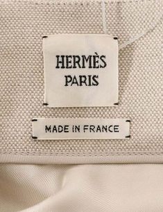 a label on the side of a white bag that says,'made in france '