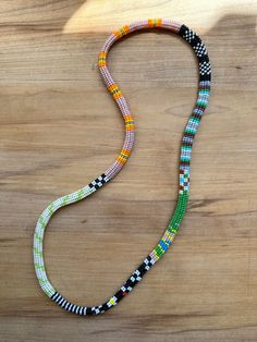 I absolutely adore making these colorful rope strands! Each bead is like a meditation for me. They take time, and I take care to stitch each bead, picking the individual colors as I like. They feel so soft in hand and bring joy and interest to anyone who sees them! This particular necklace measures approximately 13" long doubled, 29" circular. It fits over your head so no clasps! Just a simple, beautiful accessory that will liven up any outfit. Colourful Necklace, Glass Bead Necklace, Meditation, Glass Beads, Beauty Book, Beaded Necklace, Jewelry Necklaces, Accessory Gift, Display Homes