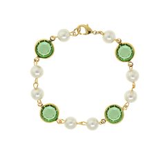 The perfect way to add a pop of color to any outfit, this beautiful single-layer bracelet features a medley of round Channel Swarovski Crystals with faux pearls. Crystals available in Blue, Purple, Light Green, Yellow, Dark Green & Dark Blue. 8mm faux pearls Genuine Swarovski Crystals Channels 14K Gold Dipped Links Measurements: 7.50"L x 0.47"W Lobster Clasp Closure Made In USA 1928 JEWELRY COLLECTION From the vaults of rich European capitals to the antique laden attics of old American estates, Channel Jewelry, Chic Fashionista, 1928 Jewelry, Crystal Fashion, Vintage Inspired Jewelry, Layered Bracelets, Gold Dipped, Blue Bracelet, Link Bracelets