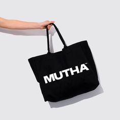 For MUTHAs on the go, our oversized tote carries all of life’s necessities. Designed with durable organic cotton and an easy-on-the-shoulder handle— it’s the perfect sustainable option for shopping at the market, working on the go and your next weekend getaway. 100% organic cotton. 100% iconic. Oversized Tote, Weekend Getaway, Skin So Soft, Weekend Getaways, The Go, Carry On, Organic Cotton, Tote Bag, Brand New