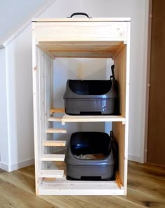 two plastic containers are sitting on top of a shelf in the corner of a room