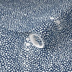 a blue and white polka dot print fabric