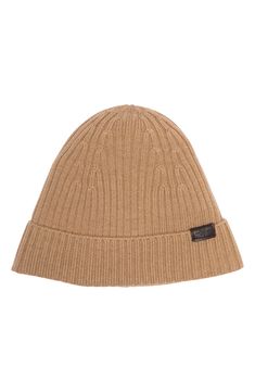 Brave the cold in this versatile and warm wool knit beanie. Round crown Ribbed wool knit construction Folded cuff 100% wool Dry clean Imported Ribbed Wool Hat For Fall, Fall Ribbed Wool Hat, Brown Wool Beanie For Fall, Classic Brown Hat For Cold Weather, Brown Classic Beanie For Winter, Classic Knitted Merino Wool Beanie, Ribbed Wool Beanie For Fall, Fall Wool Ribbed Beanie, Casual Beige Wool Hat