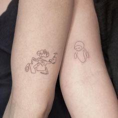 two people with matching tattoos on their legs