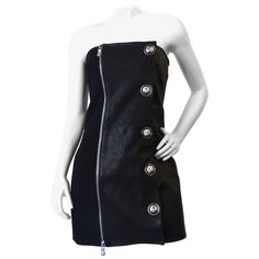 The Sexiest Cocktail Dress Is Here! Circa late 2000s, this dress is designed by Anthony Vaccarello who created a capsule collection for Versus Versace from 2014-2016. This mini strapless dress is half leather and polyester. Features a large silver plated zipper down the front and faux lion head buttons. The perfect dress or a night out! Fully lined and marked a size 44 Versace Mini Dress, Pucci Print, Png Clothes, Vintage Mini Dresses, Reality Shifting, Versus Versace, Versace Brand, Versace Dress, Where Is My Mind