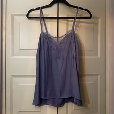 Periwinkle Satin Lace Trim Cami. Never Worn! Tags Attached, So Would Make A Great Gift! Beautiful Top In Perfect Condition With Adjustable Straps. Blue Camisole For Daywear, Blue Cami Camisole For Daywear, Fitted Blue Camisole Sleepwear, Blue V-neck Camisole For Daywear, Blue Lace Trim Camisole, Satin V-neck Camisole With Lace Trim, Blue V-neck Camisole With Adjustable Straps, Blue Seamless V-neck Camisole, Lace Trim Cami Top