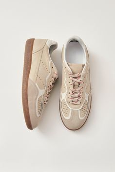 Mostly made from top-grain leather, the latest iteration of ALOHAS popular Rife sneaker is trimmed with suede across the toe for added texture. It comes in a low-top silhouette featuring rubber soles alongside all the classic details, including contrast heel tabs, exposed stitching, and logo stamps. DESIGN- Classic fit. Choose your usual size.- A lace-up sneaker inspired by the low-profile soccer styles of the '50s. - Heel Height: 2cmFABRIC & CARE- Upper: 100% Cow Suede- Lining, Insole: 100% Cow Leather- Outsole: 100% Rubber- Embellishment: 100% Cotton- Made in Portugal. Designed in Barcelona.SUSTAINABILITY- This product was created using considered materials.- Small-batch design, crafted on-demand to reduce waste. Color Crema, Nike Accessories, Nike React, Bag Icon, Color Rojo, Cold Weather Accessories, Sweater Sale, Logo Stamp, Workout Accessories