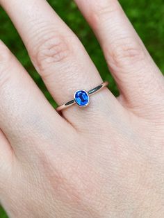 This classic style ring has a beautifully cut oval kyanite stone. Kyanite is a rich blue mineral said to help remember dreams and used for stress relief by gazing at its peaceful relaxing color. Wear on its own for classic elegance or stack with other rings! Available in whole sizes 4-10. Sterling silver. Stone is 1/4" (6mm) long. Remember Dreams, Silver Kyanite Jewelry As Gift, Luxury Kyanite Jewelry As A Gift, Silver Kyanite Jewelry For Gift, Luxury Kyanite Jewelry Gift, Blue Kyanite Gemstone Beads Jewelry, Kyanite Ring, Relaxing Colors, Crystal Accessories