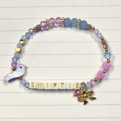 Grab some of our TS Eras Tour Friendship Bracelets to wear, trade or gift!!  ++SIZES++ Swiftie Gold Blue Wood w Tiny Key 7" Swiftie Gold Purple Blue w Purple Bird Bead + Gold Bow Charm 7" Swiftie Gold Pink White w Flower Beads + Ppnk Heart Key 7" Swiftie Gold Blue Teal w Butterfly Beads + Blue Star Charm 6.5" Swiftie B+W Green Teal Blue w Star Beads + Gold Star 6.5"  Our bracelets come in a range of sizes and styles. Don't see the size or design you need? Send us a message! :) Ts Eras Tour, Eras Tour Friendship Bracelets, Ts Eras, Eras Tour Merch, Butterfly Beads, Purple Bird, Bow Charm, Star Beads, Bird Beads